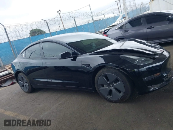 2023 Tesla Model 3 with VIN 5YJ3E1EA7PF473749, listed as a IAAI auction lot 41921478 with 21,483 mi miles and . Bid and sale history available at DreamBid. Image 12.