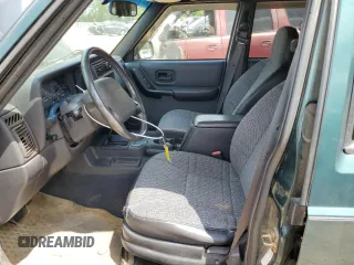 2001 Jeep Cherokee Sport with VIN 1J4FT48SX1L590135, listed as a Copart auction lot 53502945 with 362,941 mi miles and Non Repairable. Bid and sale history available at carsss.com. Image 7.