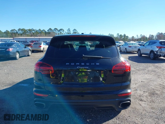 2016 Porsche Cayenne with VIN WP1AA2A21GLA02456, listed as a IAAI auction lot 41309026 with 136,266 mi miles. Bid and sale history available at carsss.com. Image 16.