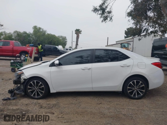 2019 Toyota Corolla L with VIN 5YFBURHE3KP895705, listed as a IAAI auction lot 42034995 with 173,719 mi miles and . Bid and sale history available at DreamBid. Image 15.