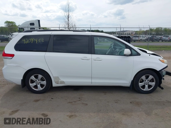 2011 Toyota Sienna LE AAS with VIN 5TDKK3DC0BS028826, listed as a IAAI auction lot 42099484 with 143,745 mi miles and . Bid and sale history available at DreamBid. Image 14.