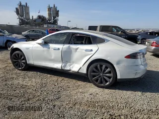 2013 Tesla Model S Performance z VIN 5YJSA1DP1DFP20689, wystawiony jako Copart lot #63685765 z przebiegiem 218 610 mil mil oraz Szkoda całkowita • Salvage title. Historia ofert i sprzedaży dostępna na DreamBid. Obrazek 2.
