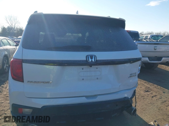 2023 Honda Passport Elite with VIN 5FNYF8H05PB005081, listed as a IAAI auction lot 41698186 with 31,853 mi miles and . Bid and sale history available at DreamBid. Image 16.