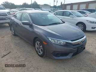 2016 Honda Civic LX z VIN 19XFC2F61GE215915, wystawiony jako IAAI lot #42264700 z przebiegiem 184 871 mil mil oraz . Historia ofert i sprzedaży dostępna na DreamBid. Obrazek 1.