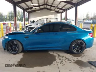 2018 BMW M2 z VIN WBS1J5C59JVA12718, wystawiony jako IAAI lot #41796602 z przebiegiem 53 707 mil mil oraz . Historia ofert i sprzedaży dostępna na DreamBid. Obrazek 15.