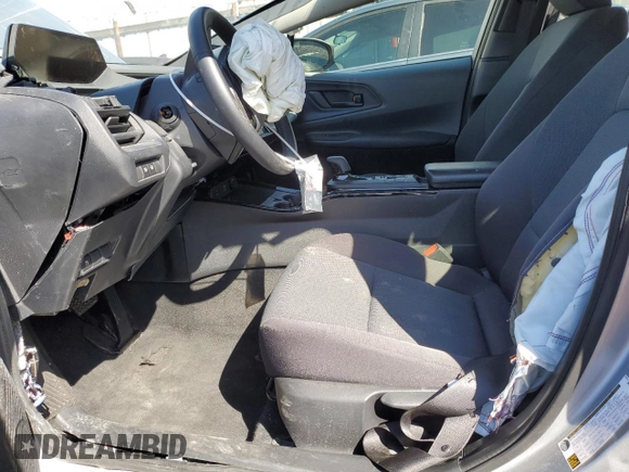 2024 Toyota Prius LE with VIN JTDACAAU4R3018502, listed as a Copart auction lot 56587885 with 22,266 mi miles and Salvage Title. Bid and sale history available at DreamBid. Image 7.