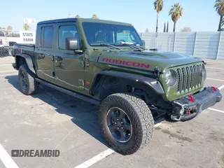 2022 Jeep Gladiator Rubicon with VIN 1C6JJTBM3NL182454, listed as a IAAI auction lot 41462212 with 24,076 mi miles and . Bid and sale history available at DreamBid. Image 1.