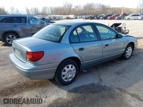 2002 Saturn SL z VIN 1G8ZH52892Z151119, wystawiony jako IAAI lot #41764757 z przebiegiem 82 017 mil mil oraz . Historia ofert i sprzedaży dostępna na DreamBid. Obrazek 4.