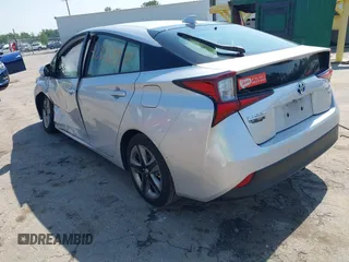 2021 Toyota Prius L Eco z VIN JTDKAMFU5M3137298, wystawiony jako IAAI lot #42270937 z przebiegiem 38 828 mil mil oraz . Historia ofert i sprzedaży dostępna na DreamBid. Obrazek 3.