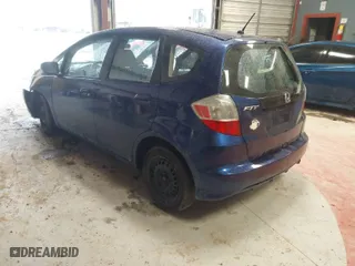2013 Honda Fit with VIN JHMGE8H33DC025099, listed as a IAAI auction lot 41555036 with 128,522 mi miles. Bid and sale history available at carsss.com. Image 3.