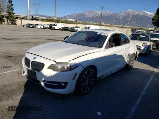 2015 BMW 2 Series 228i with VIN WBA1F5C56FV256725, listed as a Copart auction lot 40669413 with 73,037 mi miles and . Bid and sale history available at carsss.com. Image 1.