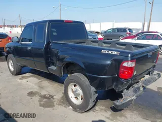 2004 Ford Ranger XL with VIN 1FTYR14U94PB02454, listed as a IAAI auction lot 41568622 with 228,742 mi miles. Bid and sale history available at carsss.com. Image 3.