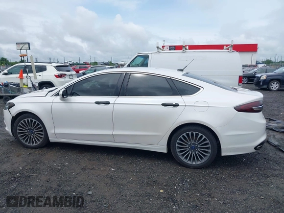 2017 Ford Fusion SE with VIN 3FA6P0H92HR178972, listed as a IAAI auction lot 42243949 with 157,544 mi miles and . Bid and sale history available at DreamBid. Image 14.