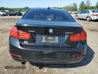 2014 BMW 3 Series 320i xDrive with VIN WBA3C3G57ENS71376, listed as a Copart auction lot 60874995 with Not provided miles and Salvage title. Bid and sale history available at DreamBid. Image 6.
