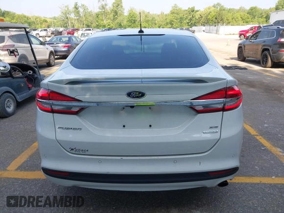 2018 Ford Fusion SE with VIN 3FA6P0HD7JR230705, listed as a IAAI auction lot 42518890 with 114,988 mi miles and . Bid and sale history available at DreamBid. Image 17.
