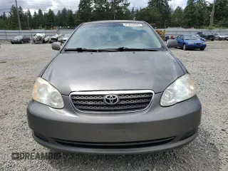 2005 Toyota Corolla CE with VIN 1NXBR32EX5Z407487, listed as a Copart auction lot 61650235 with 233,561 mi miles and Salvage title. Bid and sale history available at DreamBid. Image 5.