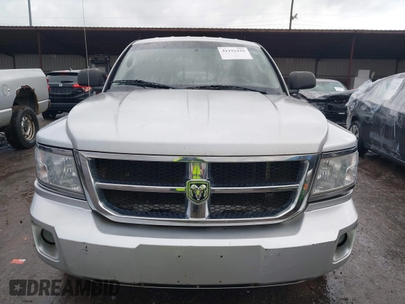 2008 Dodge Dakota SLT with VIN 1D7HW42KX8S560105, listed as a IAAI auction lot 41192410 with 99,097 mi miles and . Bid and sale history available at carsss.com. Image 6.