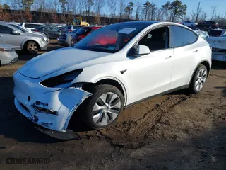 2023 Tesla Model Y Long Range with VIN 7SAYGDEE9PA173277, listed as a IAAI auction lot 41597562 with 22,666 mi miles. Bid and sale history available at carsss.com. Image 21.