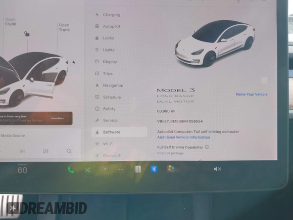 2021 Tesla Model 3 Long Range with VIN 5YJ3E1EB9MF059554, listed as a IAAI auction lot 41231520 with 63,696 mi miles and . Bid and sale history available at DreamBid. Image 14.