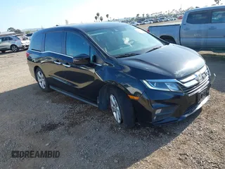 2019 Honda Odyssey EX with VIN 5FNRL6H54KB036540, listed as a IAAI auction lot 42124939 with 135,417 mi miles. Bid and sale history available at carsss.com. Image 1.