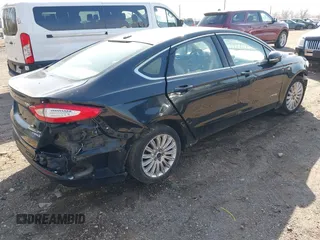 2013 Ford Fusion SE Hybrid with VIN 3FA6P0LUXDR375099, listed as a IAAI auction lot 41914387 with 133,178 mi miles. Bid and sale history available at carsss.com. Image 4.