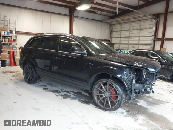 2014 Audi Q7 Premium Plus with VIN WA1LGAFE7ED003294, listed as a IAAI auction lot 42318454 with 113,719 mi miles and . Bid and sale history available at DreamBid. Image 1.