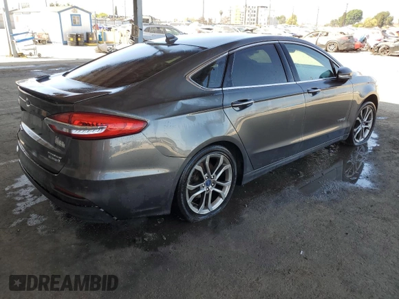 2019 Ford Fusion Titanium with VIN 3FA6P0RU0KR187602, listed as a Copart auction lot 52752425 with 153,716 mi miles and Salvage title. Bid and sale history available at DreamBid. Image 3.