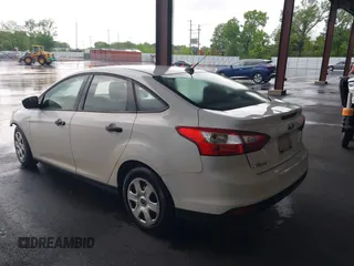 2012 Ford Focus S with VIN 1FAHP3E24CL254409, listed as a IAAI auction lot 42166880 with 123,981 mi miles and . Bid and sale history available at DreamBid. Image 3.