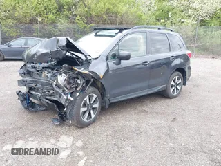 2018 Subaru Forester Premium with VIN JF2SJAEC7JH574341, listed as a IAAI auction lot 42021599 with 58,000 mi miles and . Bid and sale history available at DreamBid. Image 18.