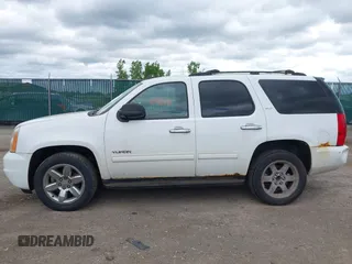 2011 GMC Yukon SLT z VIN 1GKS2CE07BR207565, wystawiony jako IAAI lot #42542596 z przebiegiem 217 759 mil mil oraz . Historia ofert i sprzedaży dostępna na DreamBid. Obrazek 15.