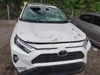 2022 Toyota RAV4 XLE Premium z VIN 2T3A1RFV1NW312419, wystawiony jako IAAI lot #42361686 z przebiegiem 14 291 mil mil oraz . Historia ofert i sprzedaży dostępna na DreamBid. Obrazek 17.
