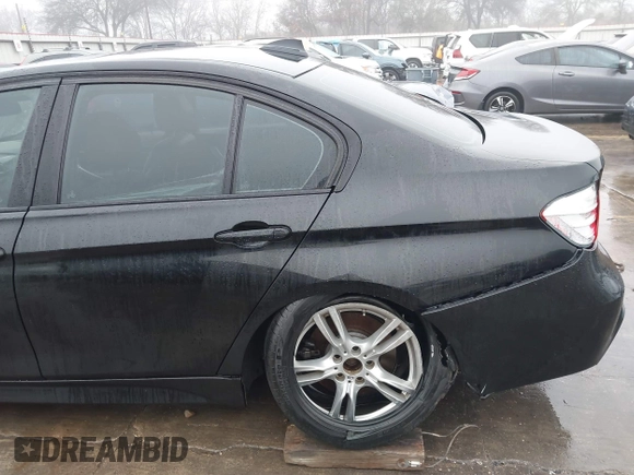 2014 BMW 3 Series 335i with VIN WBA3A9C57EF477662, listed as a IAAI auction lot 41435544 with 129,543 mi miles. Bid and sale history available at carsss.com. Image 19.