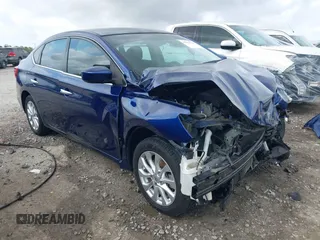 2018 Nissan Sentra S z VIN 3N1AB7AP7JY208339, wystawiony jako IAAI lot #41949758 z przebiegiem 53 265 mil mil oraz . Historia ofert i sprzedaży dostępna na DreamBid. Obrazek 1.