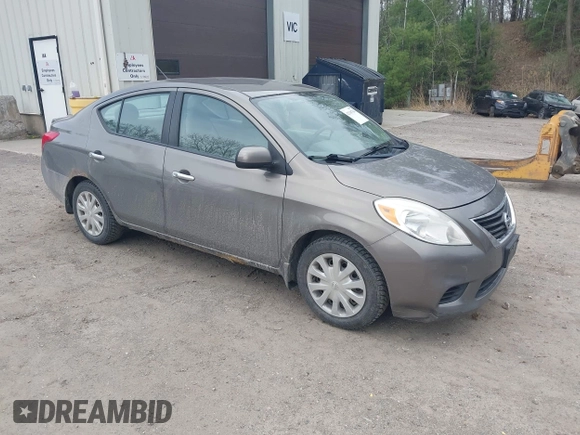 2012 Nissan Versa SV with VIN 3N1CN7AP2CL860205, listed as a IAAI auction lot 42148784 with 185,019 mi miles. Bid and sale history available at carsss.com. Image 1.