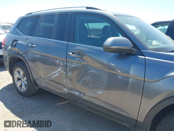 2018 Volkswagen Atlas SE with VIN 1V2CR2CA2JC576397, listed as a IAAI auction lot 41959708 with 168,619 mi miles and . Bid and sale history available at DreamBid. Image 6.