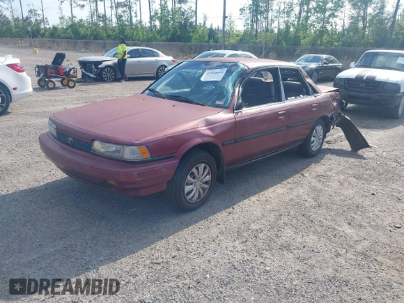 1991 Toyota Camry DLX z VIN 4T1SV21E0MU347371, wystawiony jako IAAI lot #42048695 z przebiegiem 209 451 mil mil oraz . Historia ofert i sprzedaży dostępna na DreamBid. Obrazek 2.