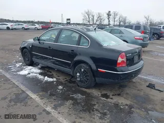 2003 Volkswagen Passat GL with VIN WVWMD63B03P039933, listed as a IAAI auction lot 41485822 with 133,907 mi miles. Bid and sale history available at carsss.com. Image 3.