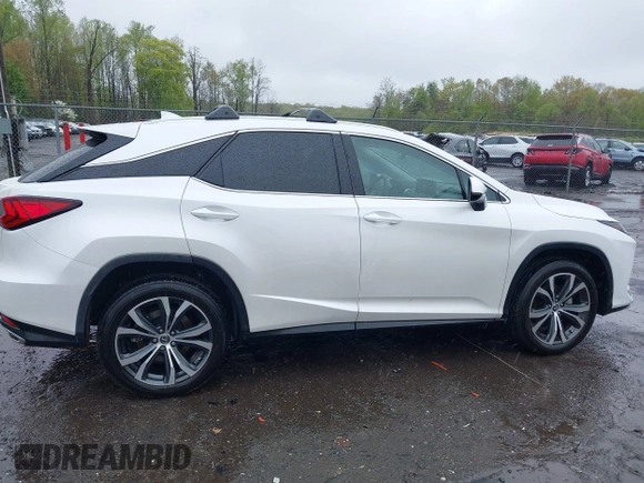 2021 Lexus RX with VIN 2T2HZMDA3MC266624, listed as a IAAI auction lot 42011029 with 27,401 mi miles. Bid and sale history available at carsss.com. Image 14.