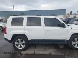 2014 Jeep Patriot Sport with VIN 1C4NJRBB3ED509117, listed as a IAAI auction lot 41799057 with 161,663 mi miles. Bid and sale history available at carsss.com. Image 13.