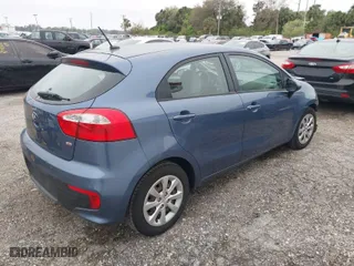 2016 Kia Rio LX with VIN KNADM5A38G6638934, listed as a IAAI auction lot 41566769 with 76,355 mi miles. Bid and sale history available at carsss.com. Image 4.