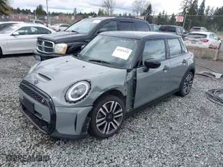 2023 MINI Hardtop 4 Door Cooper S with VIN WMW53DK06P2T05743, listed as a IAAI auction lot 41921232 with 12,017 mi miles. Bid and sale history available at carsss.com. Image 2.