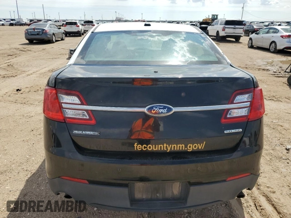 2014 Ford Police Interceptor with VIN 1FAHP2L81EG148870, listed as a Copart auction lot 73039214 with 255,800 mi miles and Salvage title. Bid and sale history available at DreamBid. Image 6.