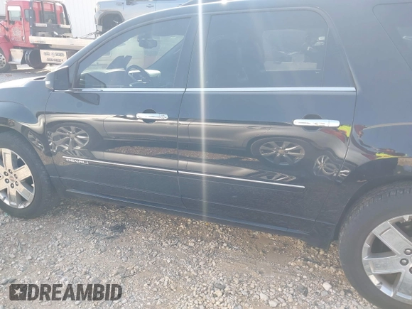2016 GMC Acadia Denali with VIN 1GKKRTKD0GJ349149, listed as a IAAI auction lot 40554328 with 111,675 mi miles. Bid and sale history available at carsss.com. Image 14.