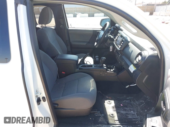 2023 Toyota Tacoma SR with VIN 3TYRX5GN7PT087621, listed as a IAAI auction lot 41969368 with 17,580 mi miles and . Bid and sale history available at DreamBid. Image 5.