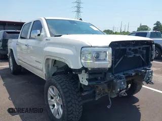 2014 GMC Sierra 1500 SLT with VIN 3GTU2VEC1EG229351, listed as a IAAI auction lot 42656983 with 181,289 mi miles and . Bid and sale history available at DreamBid. Image 1.