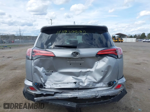 2018 Toyota RAV4 XLE with VIN 2T3WFREV9JW410102, listed as a IAAI auction lot 41929892 with 75,422 mi miles and . Bid and sale history available at carsss.com. Image 16.