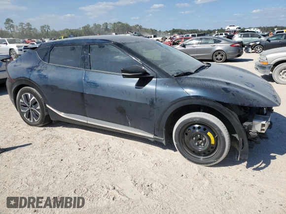 2022 Kia EV6 Wind with VIN KNDC34LA4N5056811, listed as a Copart auction lot 76199814 with 71,794 mi miles and Salvage Title. Bid and sale history available at carsss.com. Image 4.