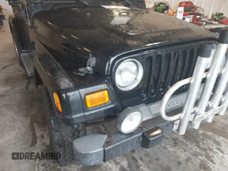 2005 Jeep Wrangler X with VIN 1J4FA39S95P356033, listed as a IAAI auction lot 42252776 with 40,512 mi miles and . Bid and sale history available at DreamBid. Image 6.