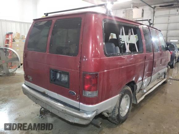 2002 Ford Econoline Passenger XL with VIN 1FMRE11W82HB74447, listed as a Copart auction lot 60527942 with 196,426 mi miles and Non Repairable. Bid and sale history available at DreamBid. Image 4.