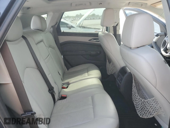 2016 Cadillac SRX Luxury Collection with VIN 3GYFNBE37GS516735, listed as a Copart auction lot 58193765 with 82,329 mi miles and Salvage title. Bid and sale history available at DreamBid. Image 11.